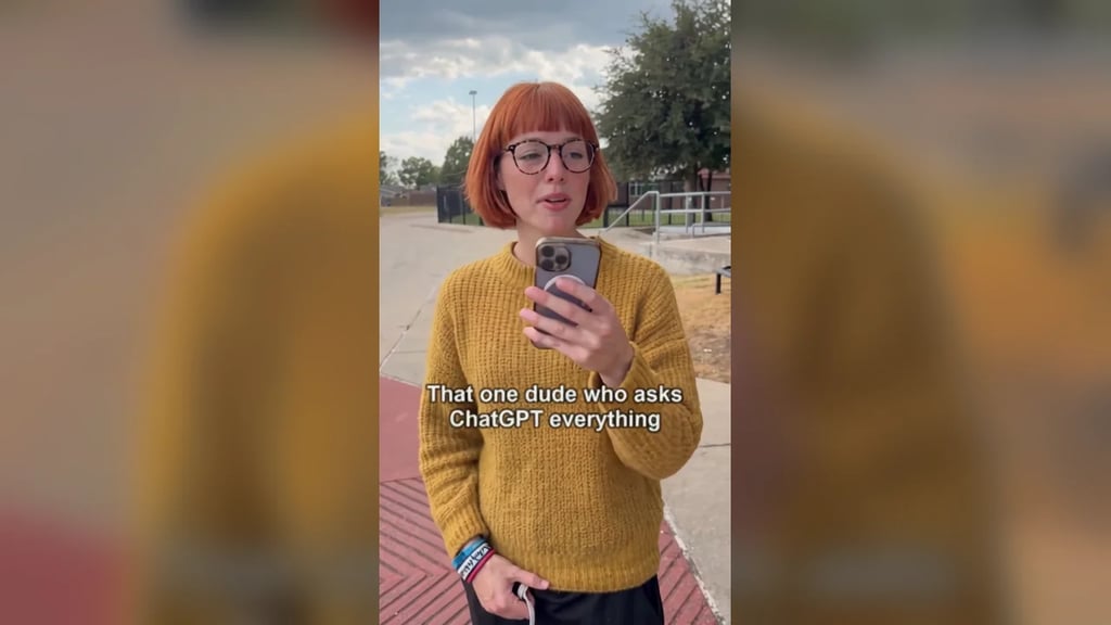 A woman in glasses and a mustard sweater holds a phone up to her mouth in a park, under the caption That one dude who asks ChatGPT everything